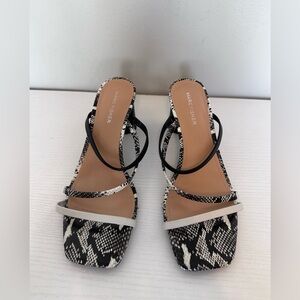 Marc Fisher black and white strappy heels.